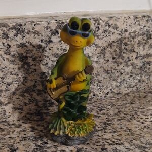 Green and Yellow Frog Figurine with Guitar